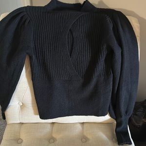 Sexy woman’s sweater.